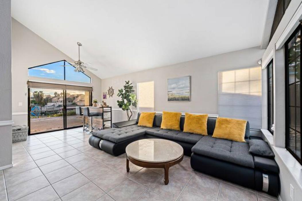 2066 Sand Point Road Discovery Bay, CA 94505 - Photo 7 of 36 a living room with furniture and a large window