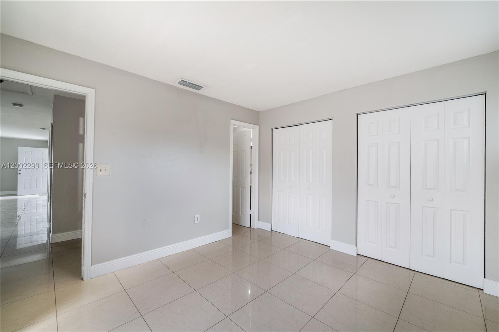 11310 Southwest 189th Street, Unit 11310 Miami, FL 33157 - Photo 11 of 24 a view of an empty room