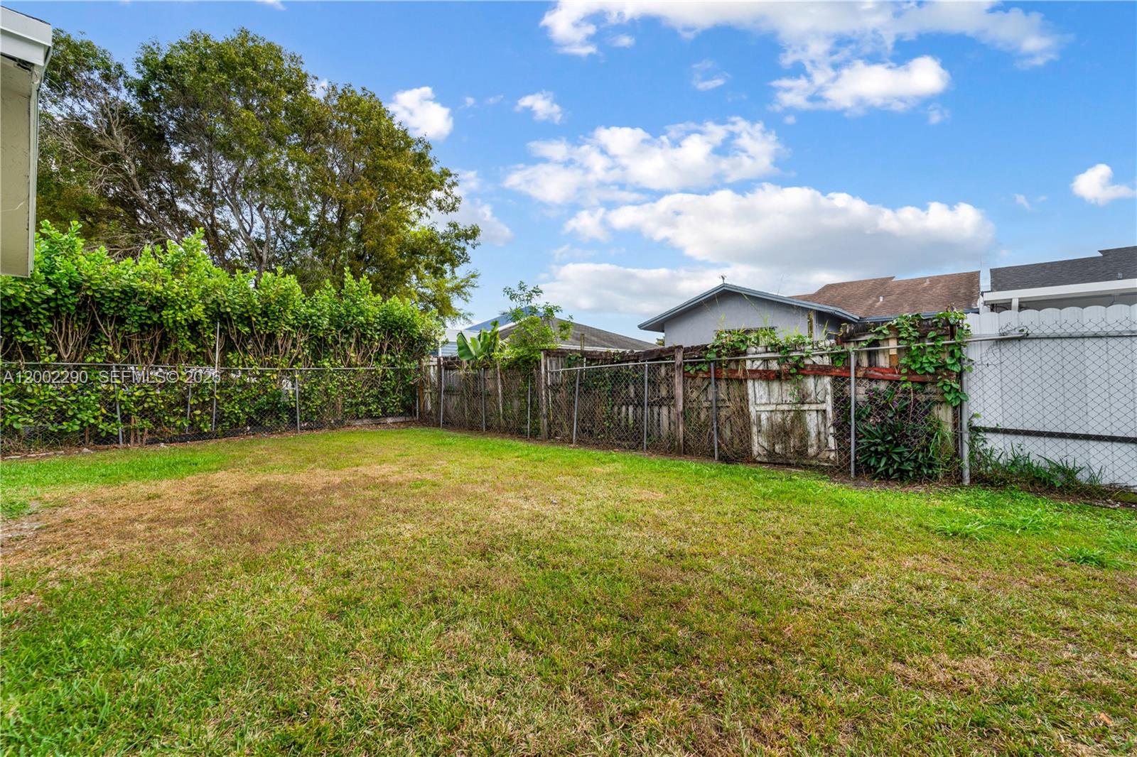 11310 Southwest 189th Street, Unit 11310 Miami, FL 33157 - Photo 20 of 24 a view of a backyard