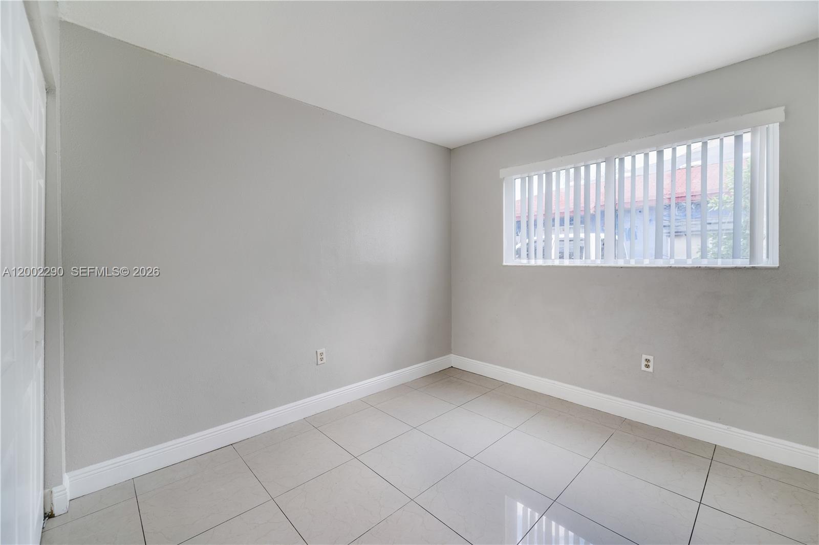 11310 Southwest 189th Street, Unit 11310 Miami, FL 33157 - Photo 8 of 24 a view of room with window