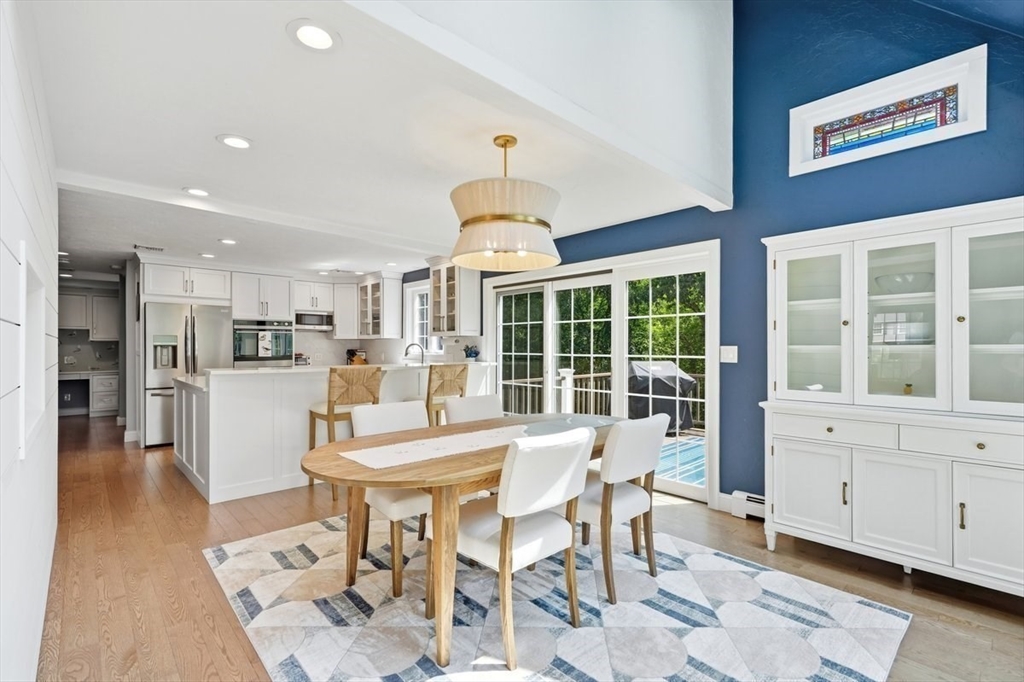 47 Old Coach Road Cohasset, MA 02025 - Photo 15 of 40 a view of a dining room with furniture window and wooden floor
