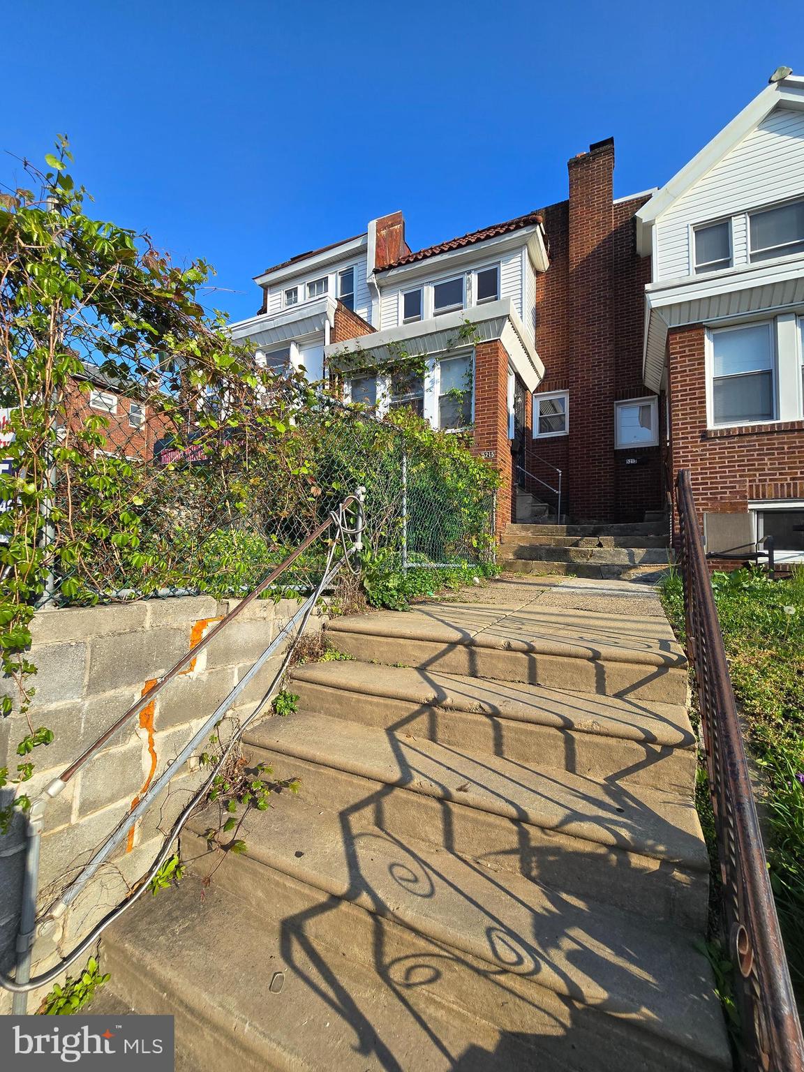 5215 North Tabor Road Philadelphia, PA 19124 - Photo 1 of 14 a view of a building with a yard