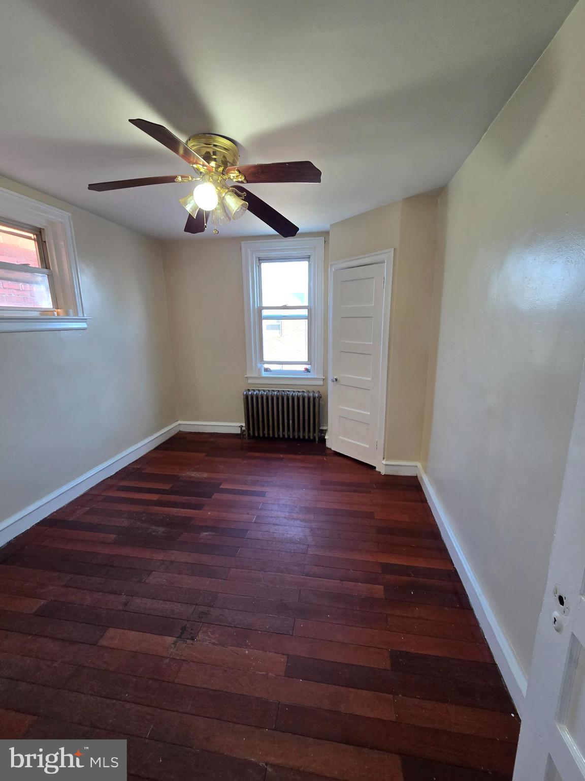 5215 North Tabor Road Philadelphia, PA 19124 - Photo 14 of 14 a view of empty room with wooden floor and fan