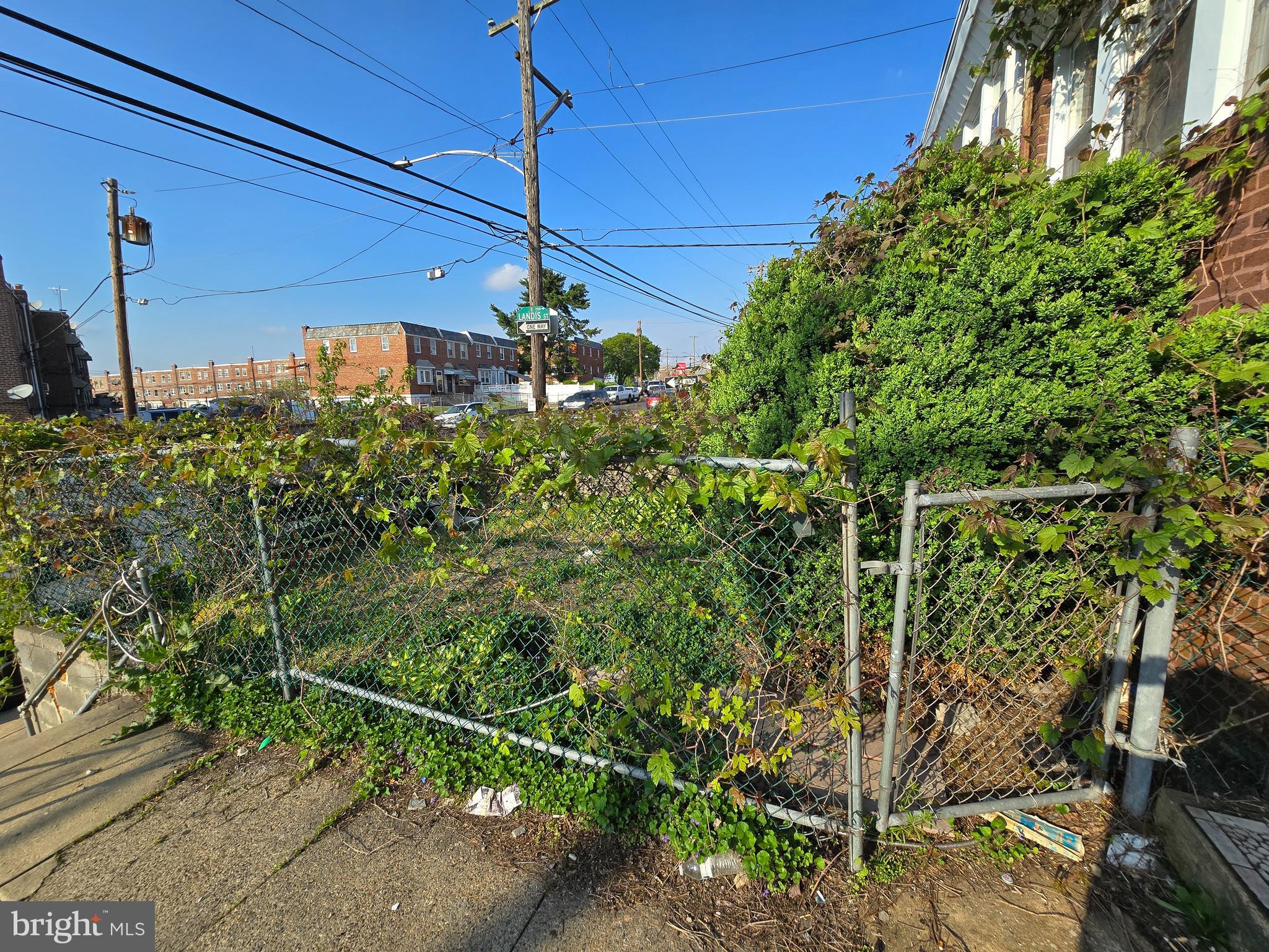 5215 North Tabor Road Philadelphia, PA 19124 - Photo 2 of 14 a view of a house with a tree in the background