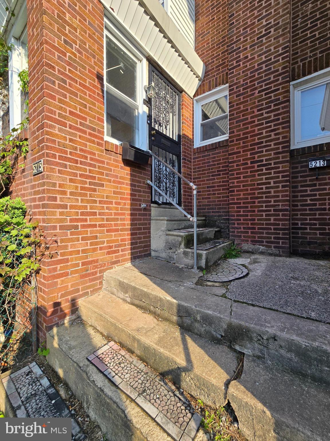 5215 North Tabor Road Philadelphia, PA 19124 - Photo 3 of 14 a brick building with a street