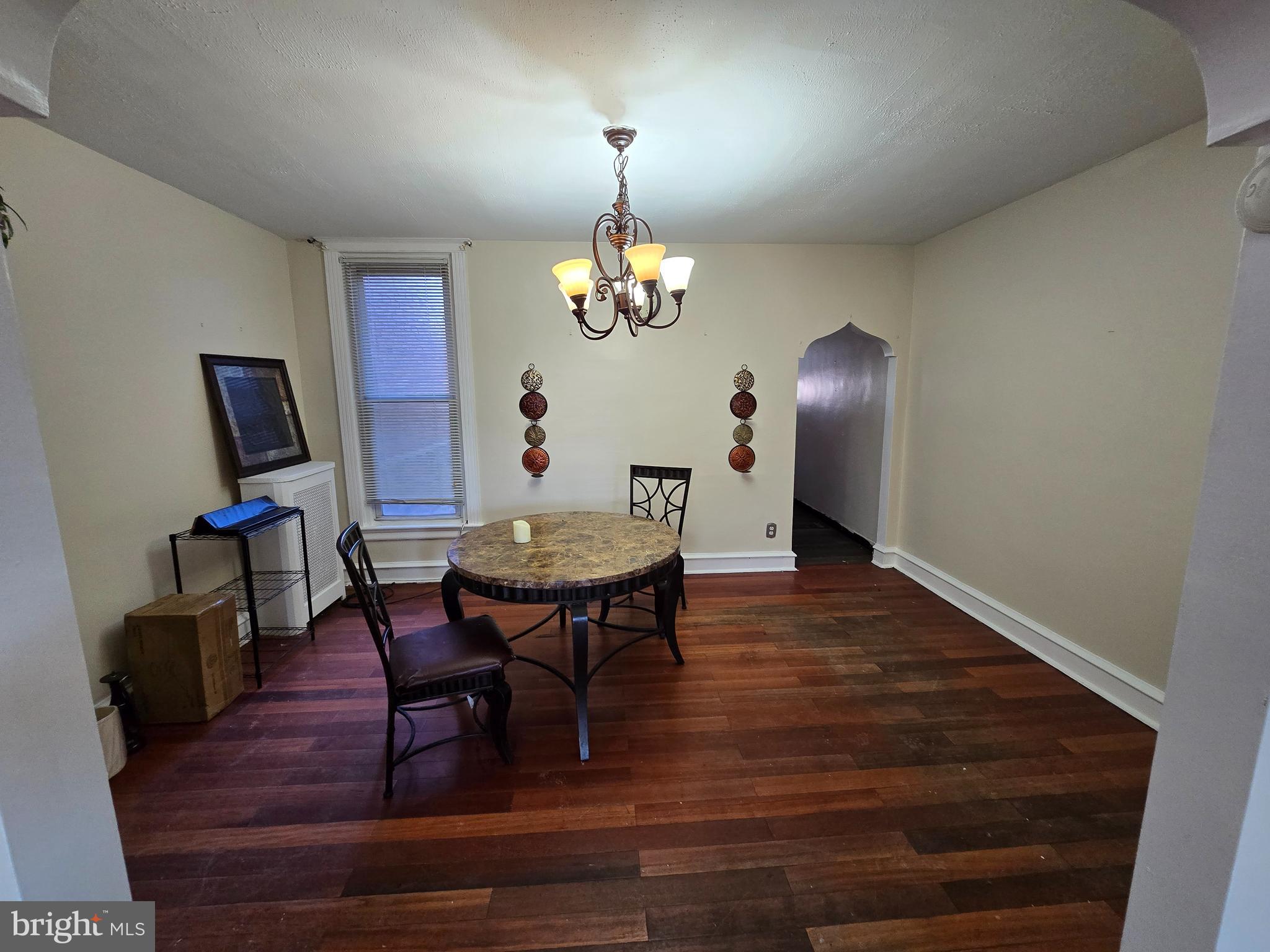 5215 North Tabor Road Philadelphia, PA 19124 - Photo 5 of 14 a view of a dining room with furniture and wooden floor