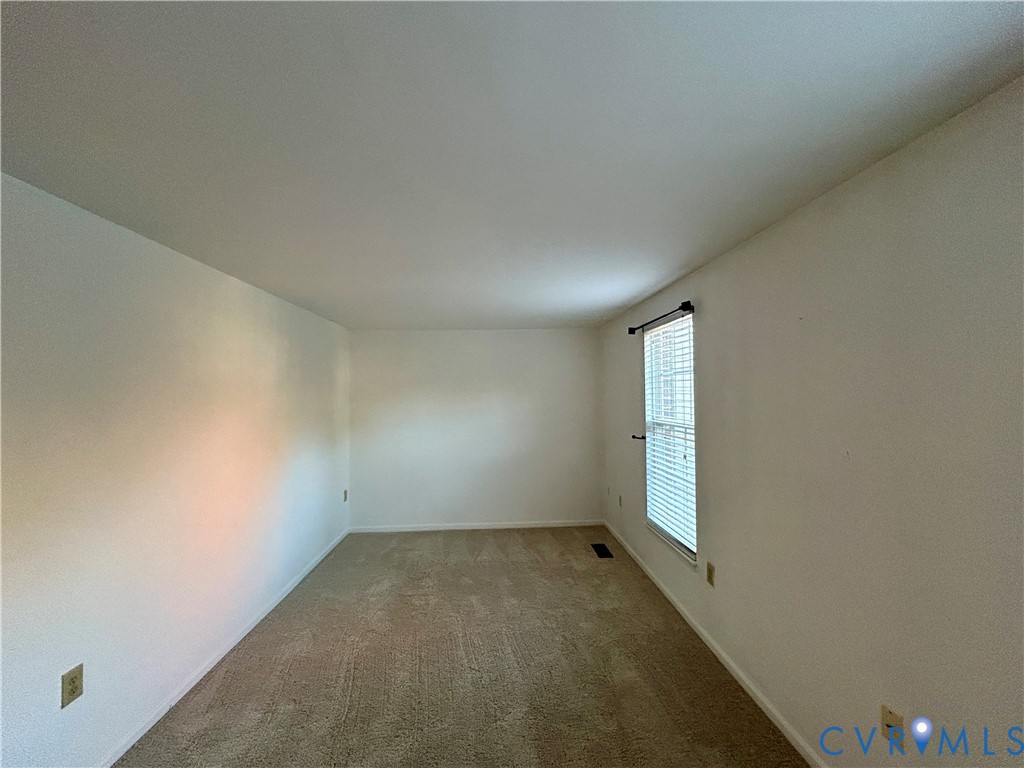 3063 Montfort Loop Henrico, VA 23294 - Photo 13 of 22 an empty room with a empty space and window