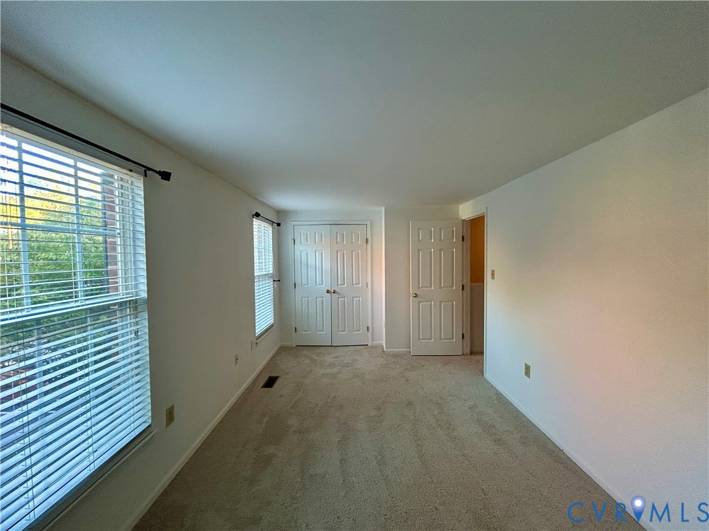 3063 Montfort Loop Henrico, VA 23294 - Photo 14 of 22 a view of an empty room with a window