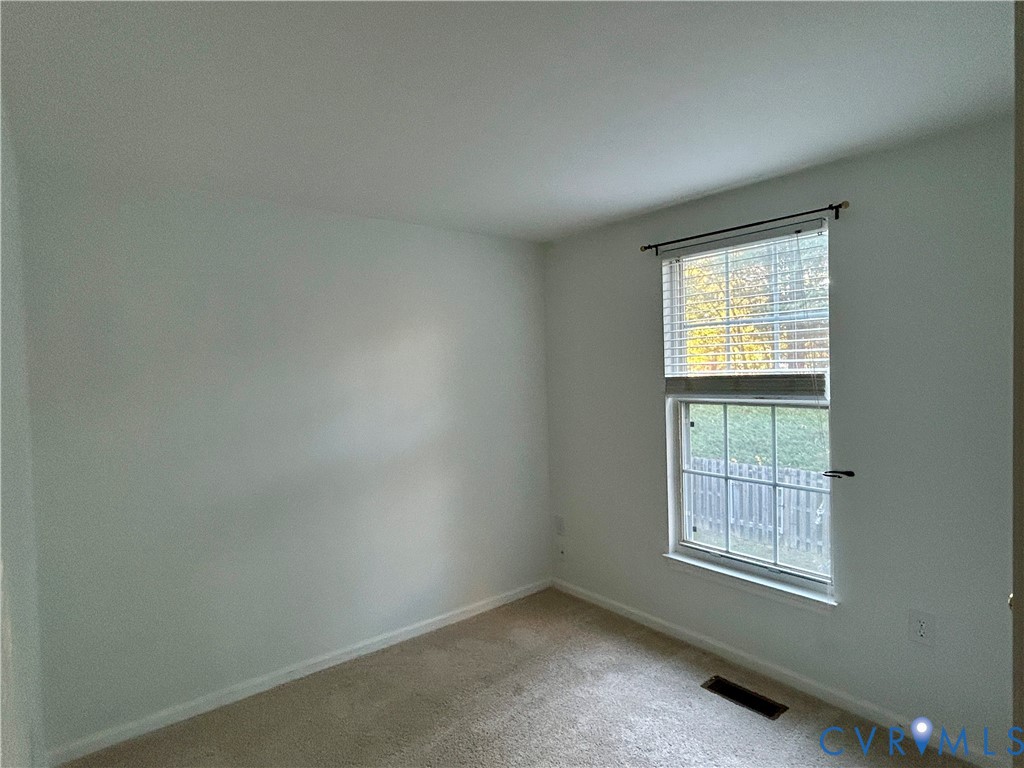 3063 Montfort Loop Henrico, VA 23294 - Photo 19 of 22 an empty room with a window