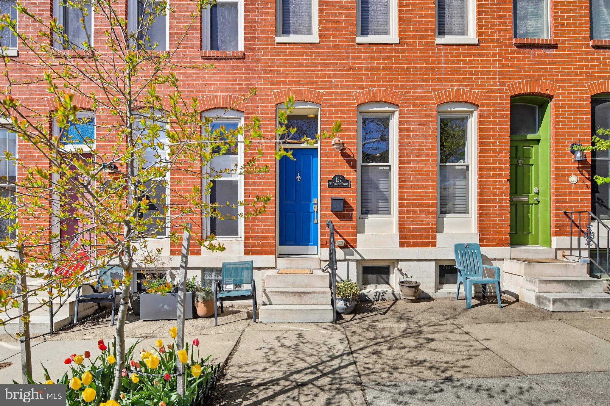122 West Clement Street Baltimore, MD 21230 - Photo 1 of 40 a front view of a building with many windows