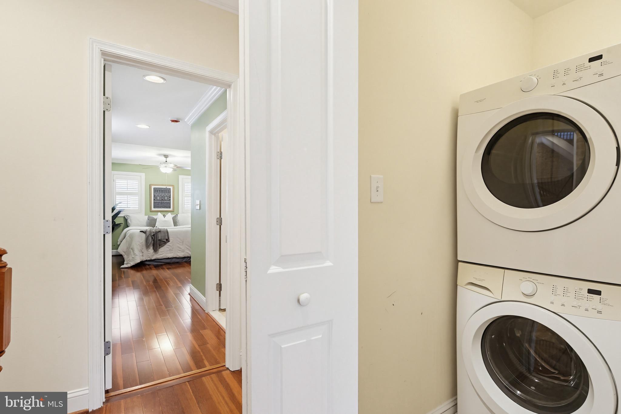 122 West Clement Street Baltimore, MD 21230 - Photo 22 of 40 a view of a hallway with washer and dryer