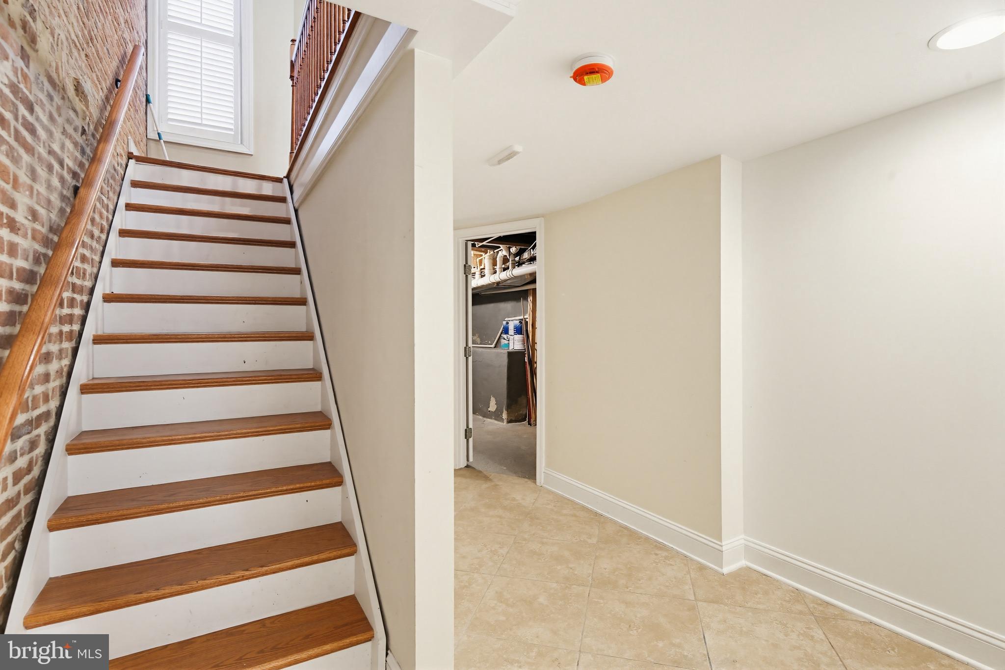 122 West Clement Street Baltimore, MD 21230 - Photo 26 of 40 a view of a hallway with wooden floor and entryway