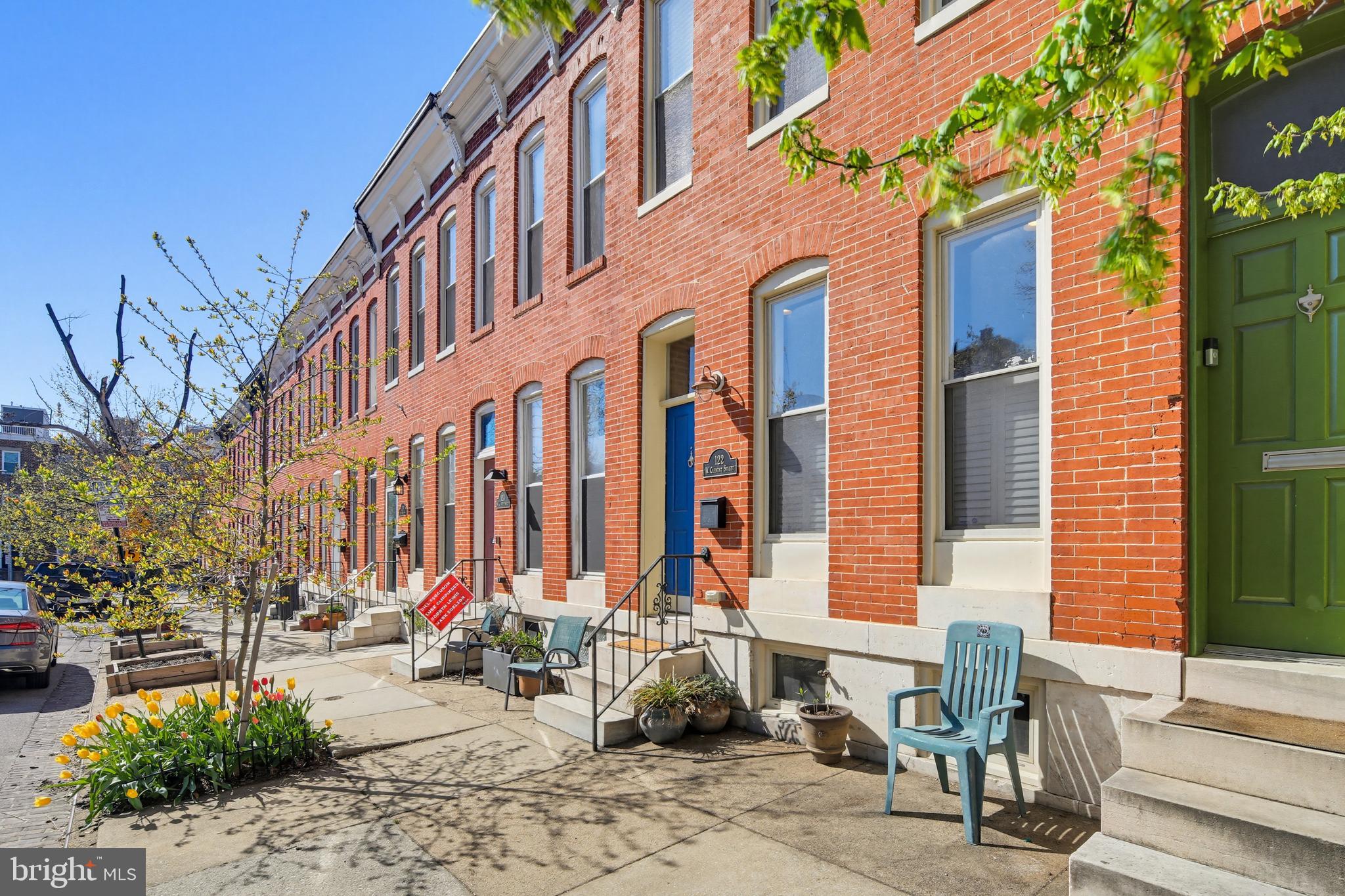 122 West Clement Street Baltimore, MD 21230 - Photo 40 of 40 a front view of a building with outdoor seating