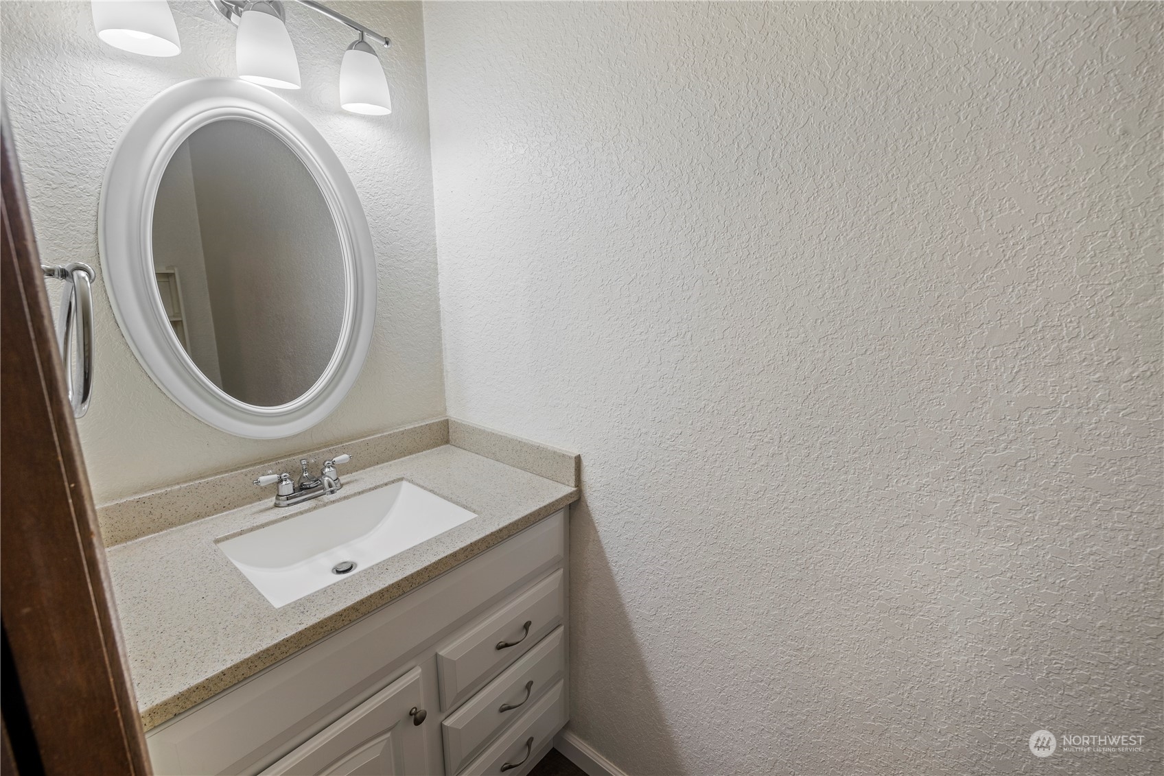 120 124th Street Southwest, Unit F2 Everett, WA 98204 - Photo 10 of 19 a bathroom with a sink and a mirror