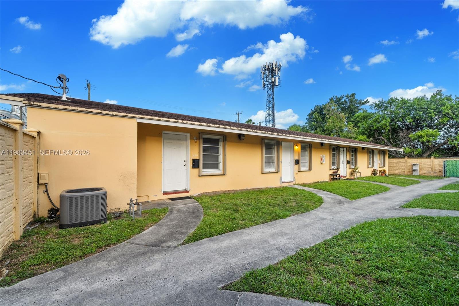 840 Southwest 7th Street, Unit 850 Miami, FL 33130 - Photo 11 of 12 a front view of a house with garden