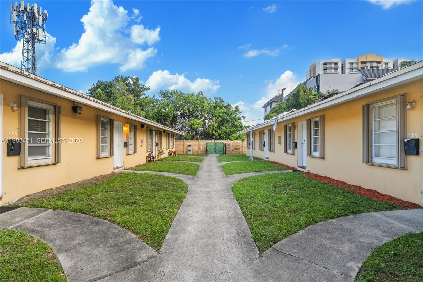 840 Southwest 7th Street, Unit 850 Miami, FL 33130 - Photo 12 of 12 a view of a house with backyard and garden