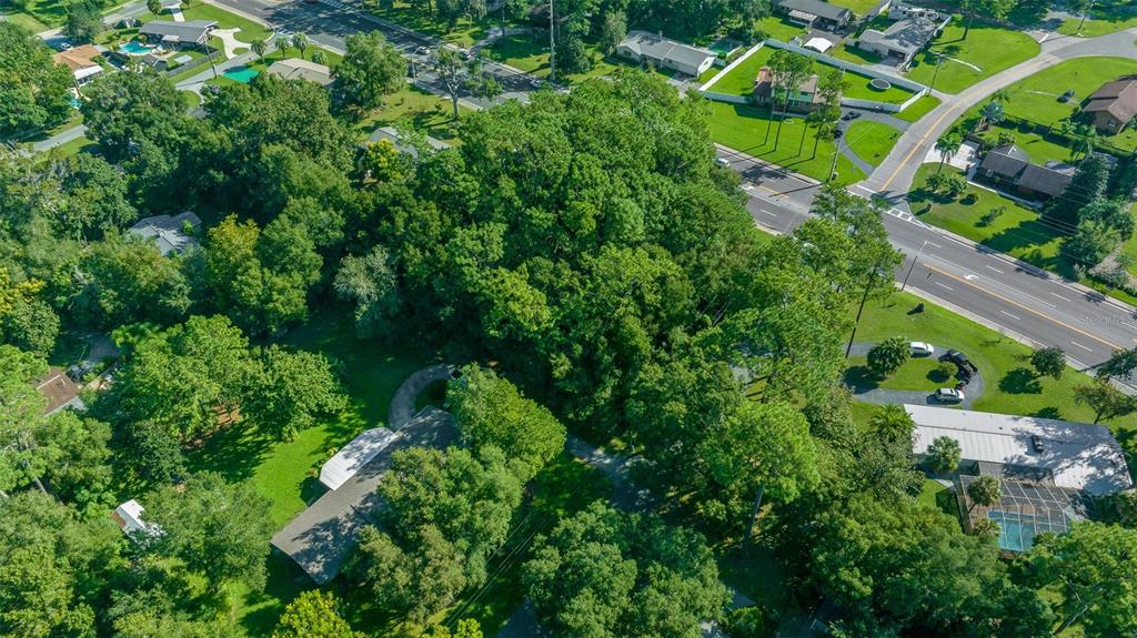 0 Southeast 15th Street Ocala, FL 34471 - Photo 14 of 22 an aerial view of residential house with outdoor space and trees all around