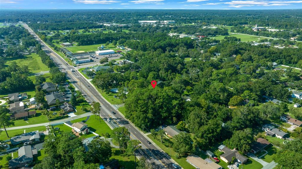 0 Southeast 15th Street Ocala, FL 34471 - Photo 7 of 22 a view of a city with lush green forest