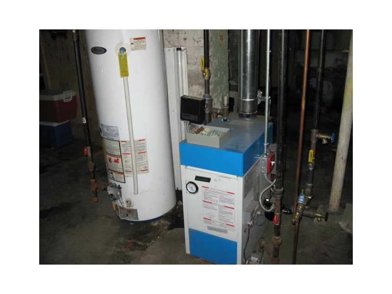31 Paradis Avenue Woonsocket, RI 02895 - Photo 12 of 12 Other. ALMOST NEW 1ST FLOOR BOILER AND HOUSE HOT WATER TANK.