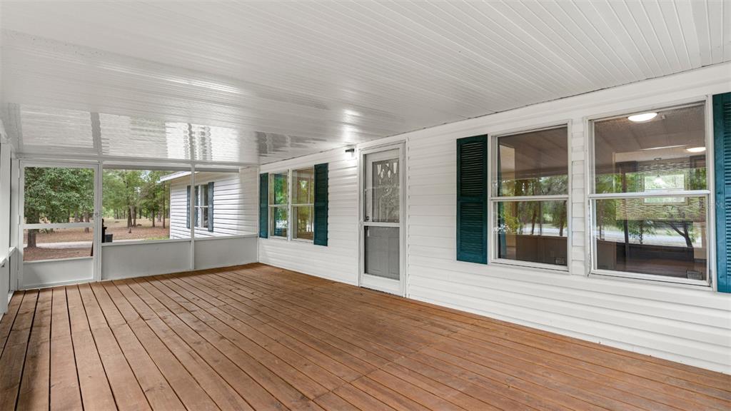 10379 Southwest 135 Street Archer, FL 32618 - Photo 4 of 45 a view of an entryway with wooden floor