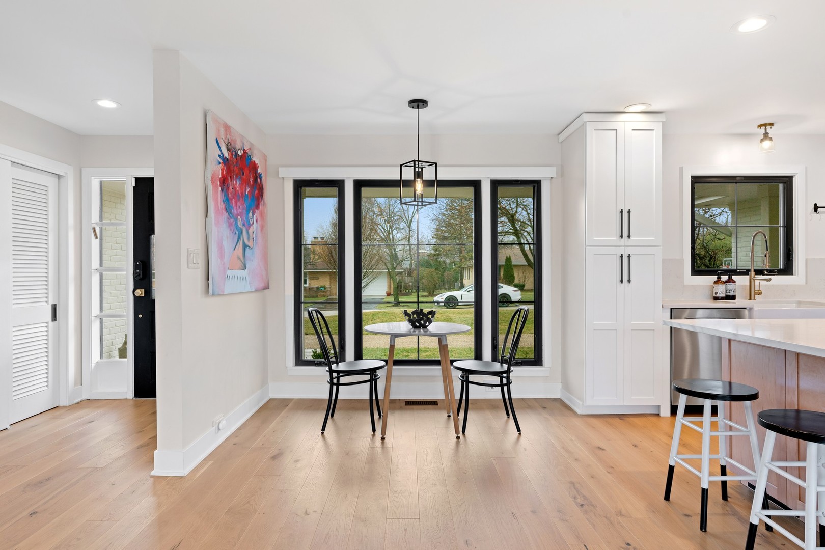 1975 Valley View Road Northfield, IL 60093 - Photo 15 of 40 a living room with furniture and a large window