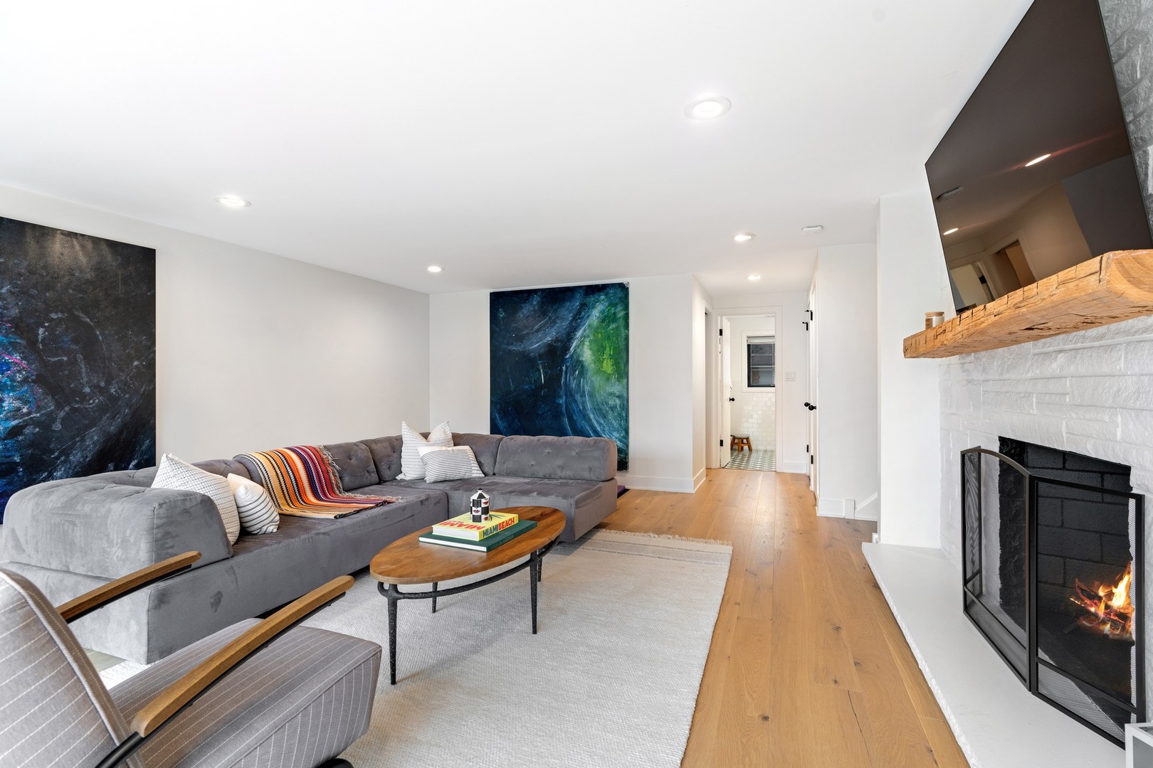 1975 Valley View Road Northfield, IL 60093 - Photo 18 of 40 a living room with furniture and a fireplace
