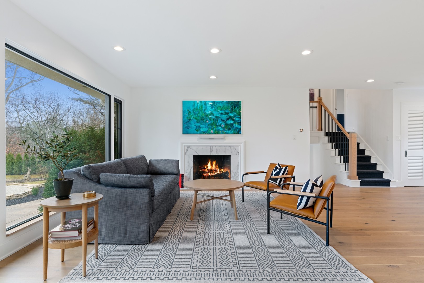 1975 Valley View Road Northfield, IL 60093 - Photo 5 of 40 a living room with furniture and a fireplace
