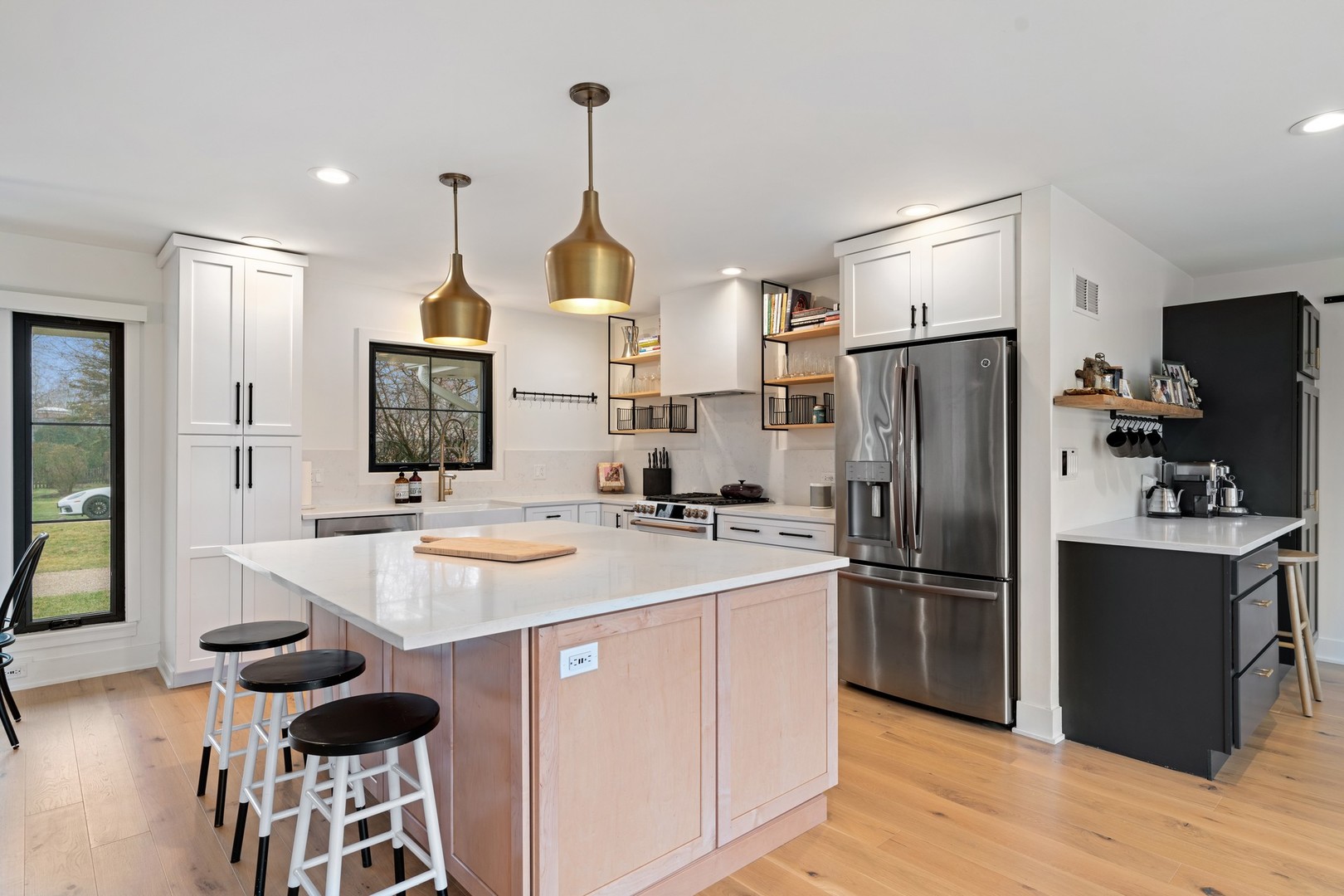 1975 Valley View Road Northfield, IL 60093 - Photo 7 of 40 a kitchen with sink refrigerator and microwave