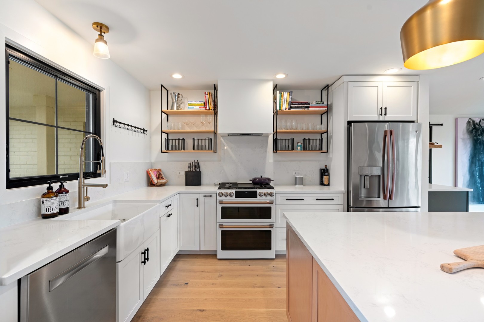 1975 Valley View Road Northfield, IL 60093 - Photo 9 of 40 a kitchen with stainless steel appliances a sink stove and refrigerator