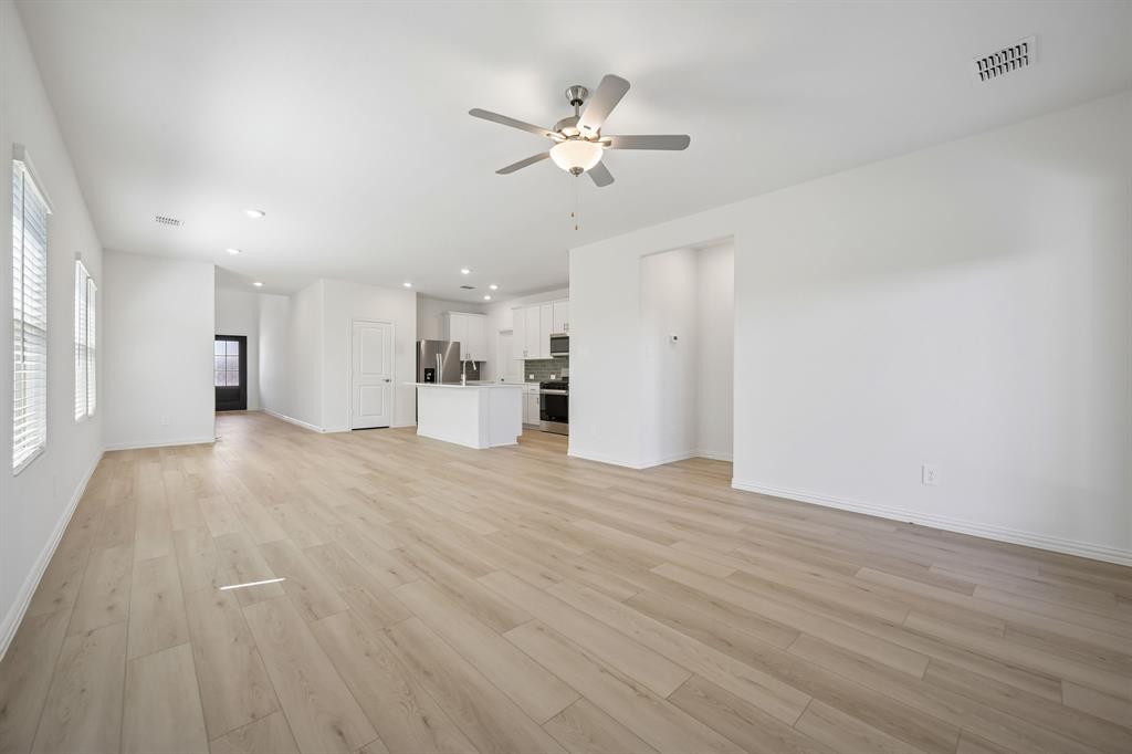 1705 Arches Road Anna, TX 75409 - Photo 7 of 33 a view of an empty room with a window
