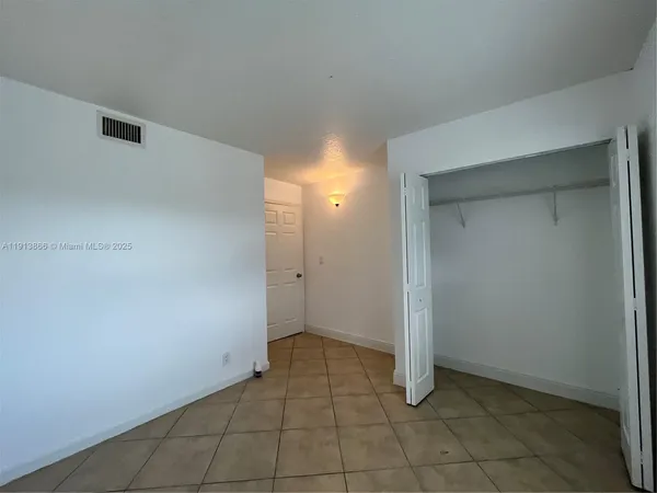 a bathroom with a sink a toilet and a shower