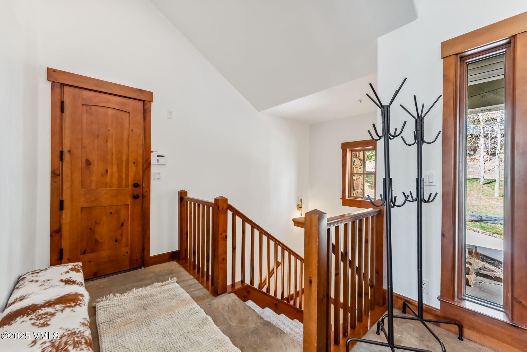 268 Bachelor Ridge Road Avon, CO 81620 - Photo 12 of 25 a view of a bedroom with furniture and window