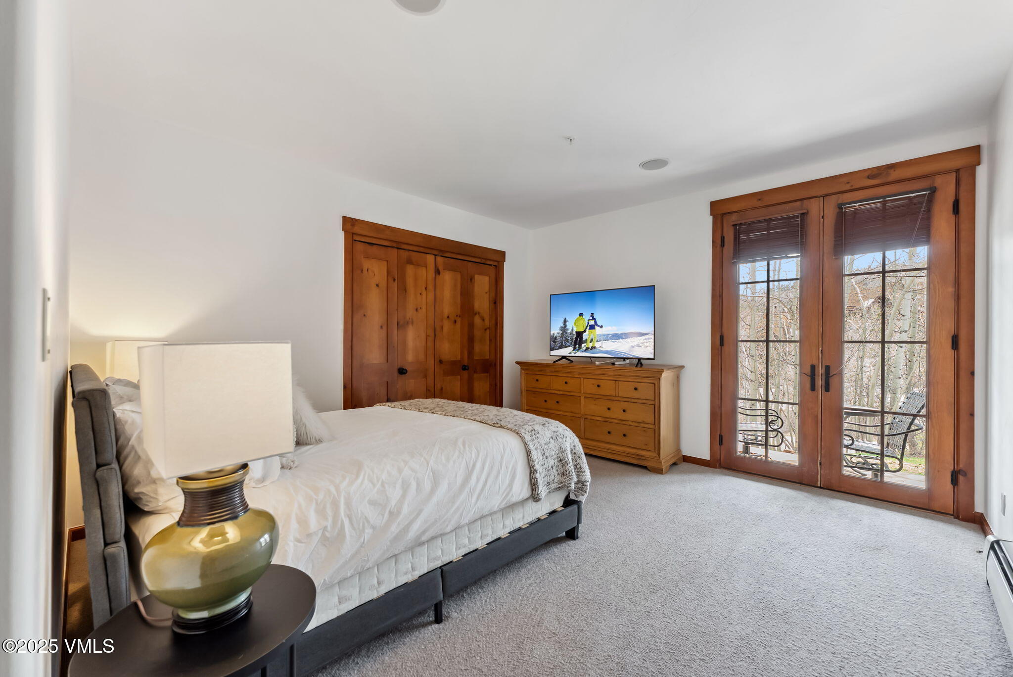 268 Bachelor Ridge Road Avon, CO 81620 - Photo 13 of 25 a bedroom with a bed and window