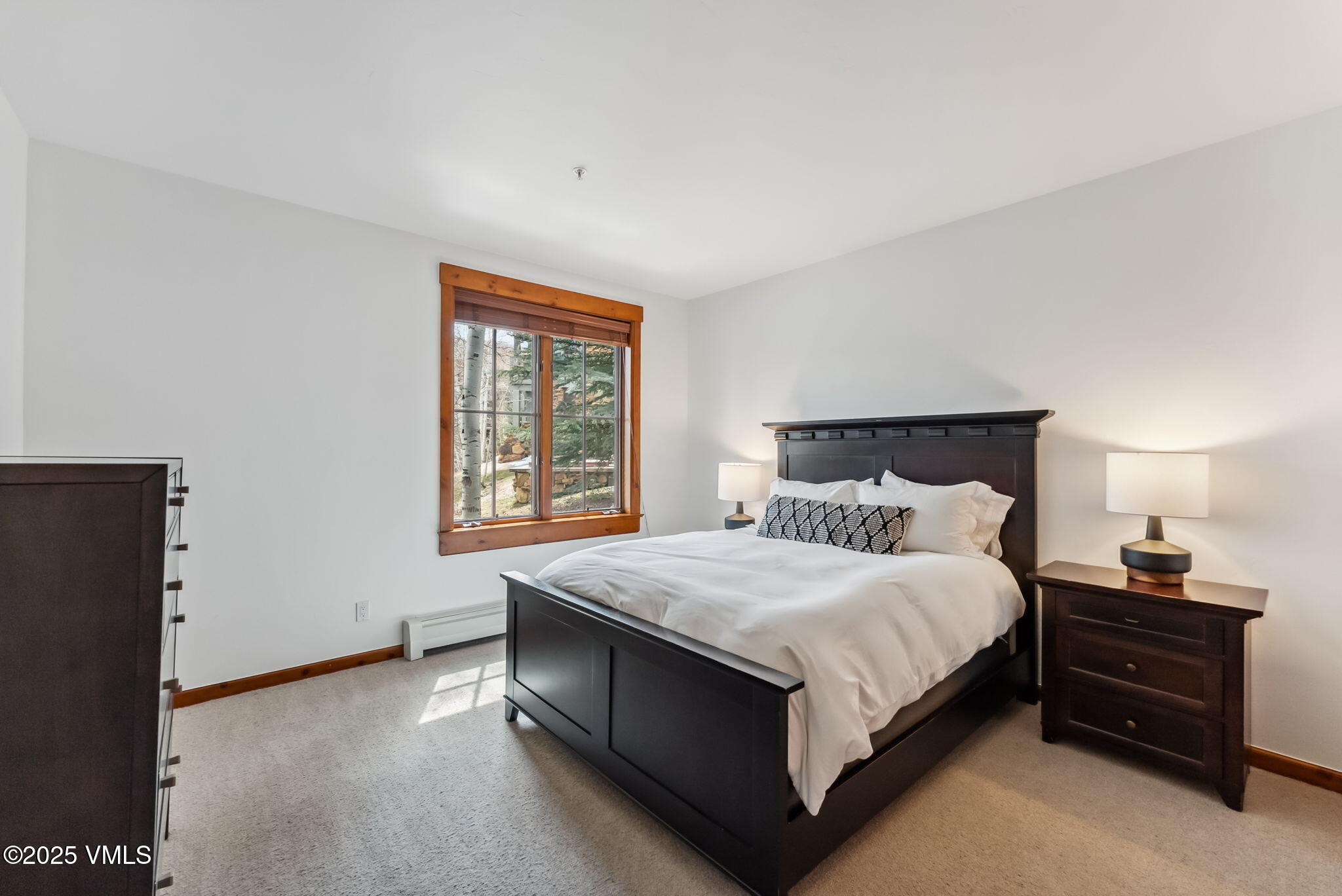 268 Bachelor Ridge Road Avon, CO 81620 - Photo 15 of 25 a bedroom with a bed and window