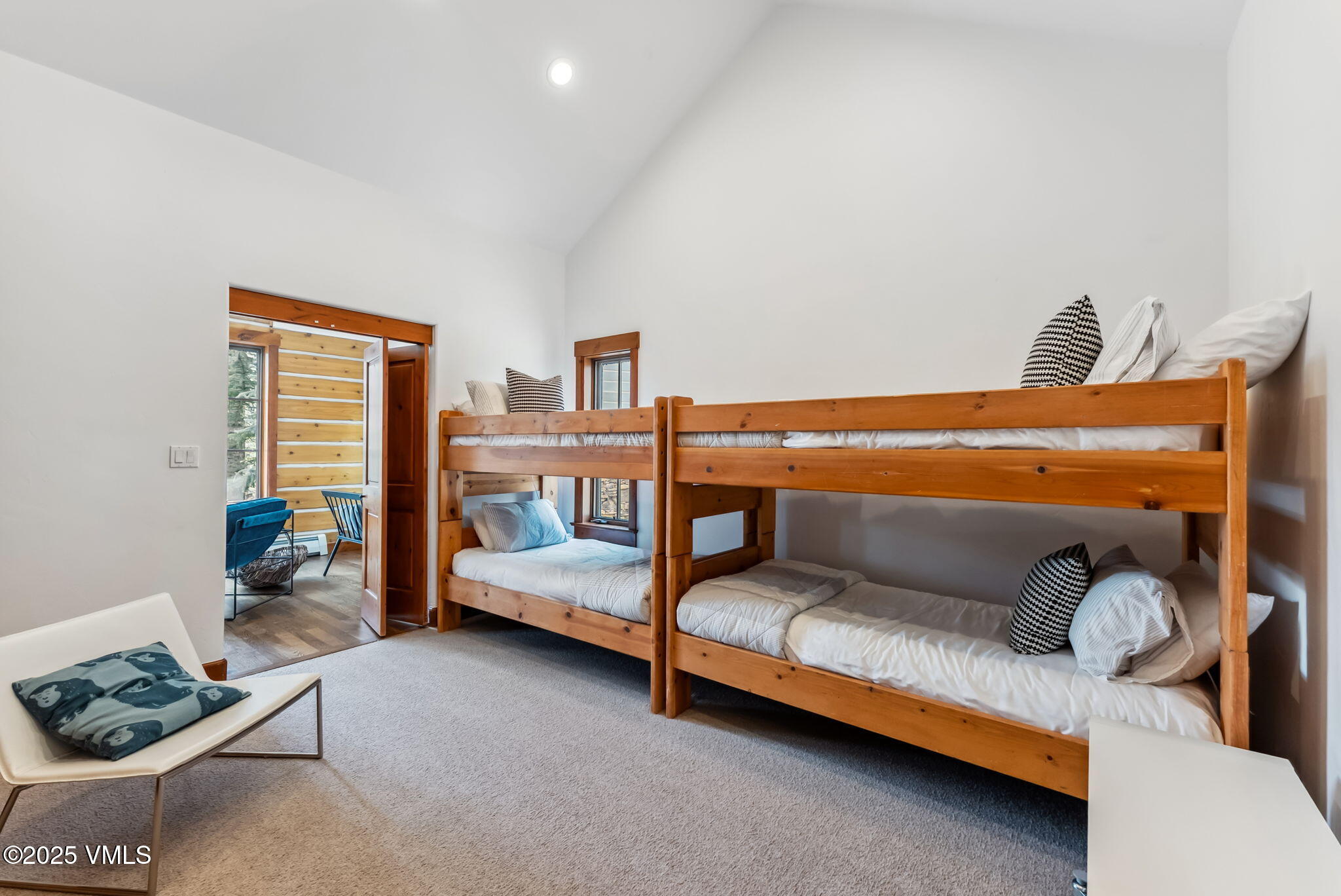 268 Bachelor Ridge Road Avon, CO 81620 - Photo 19 of 25 a bedroom with furniture and a window