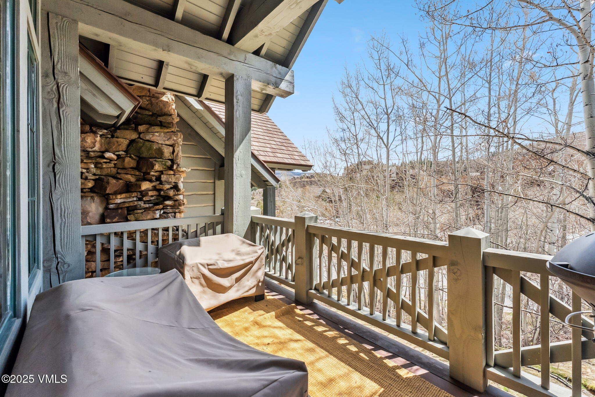 268 Bachelor Ridge Road Avon, CO 81620 - Photo 23 of 25 a view of a balcony with chair
