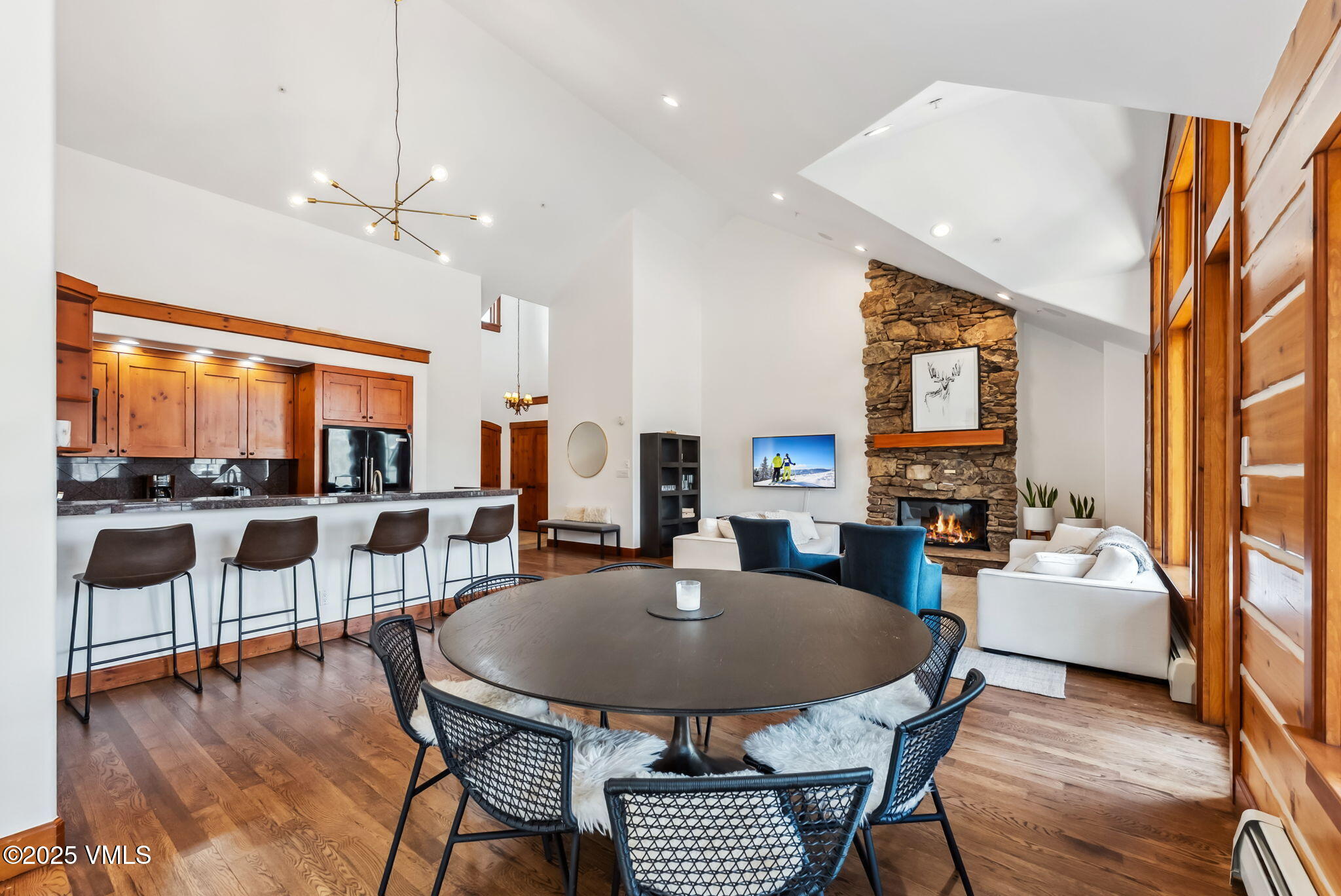 268 Bachelor Ridge Road Avon, CO 81620 - Photo 6 of 25 a view of a dining room with furniture and wooden floor