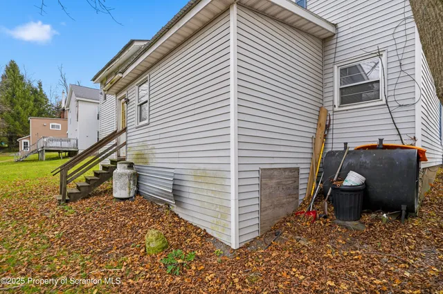 a view of a chairs with a backyard