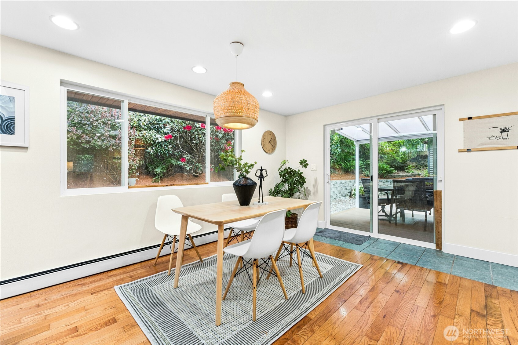 18152 145th Avenue Southeast Renton, WA 98058 - Photo 11 of 40 a view of a dining room with furniture window and outside view