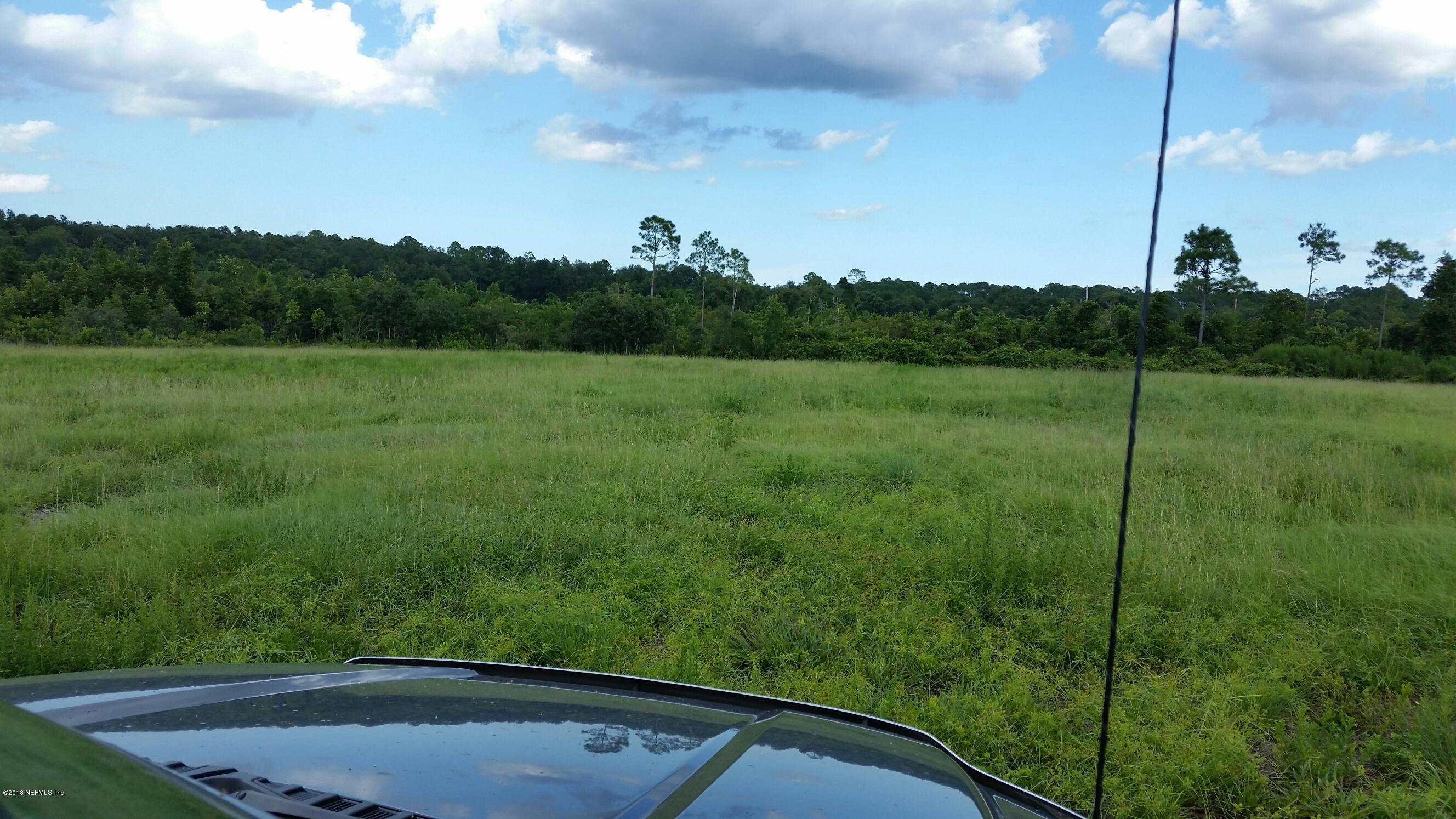 225 Church Road Crescent City, FL 32112 - Photo 8 of 12 Along tree line is entrance
