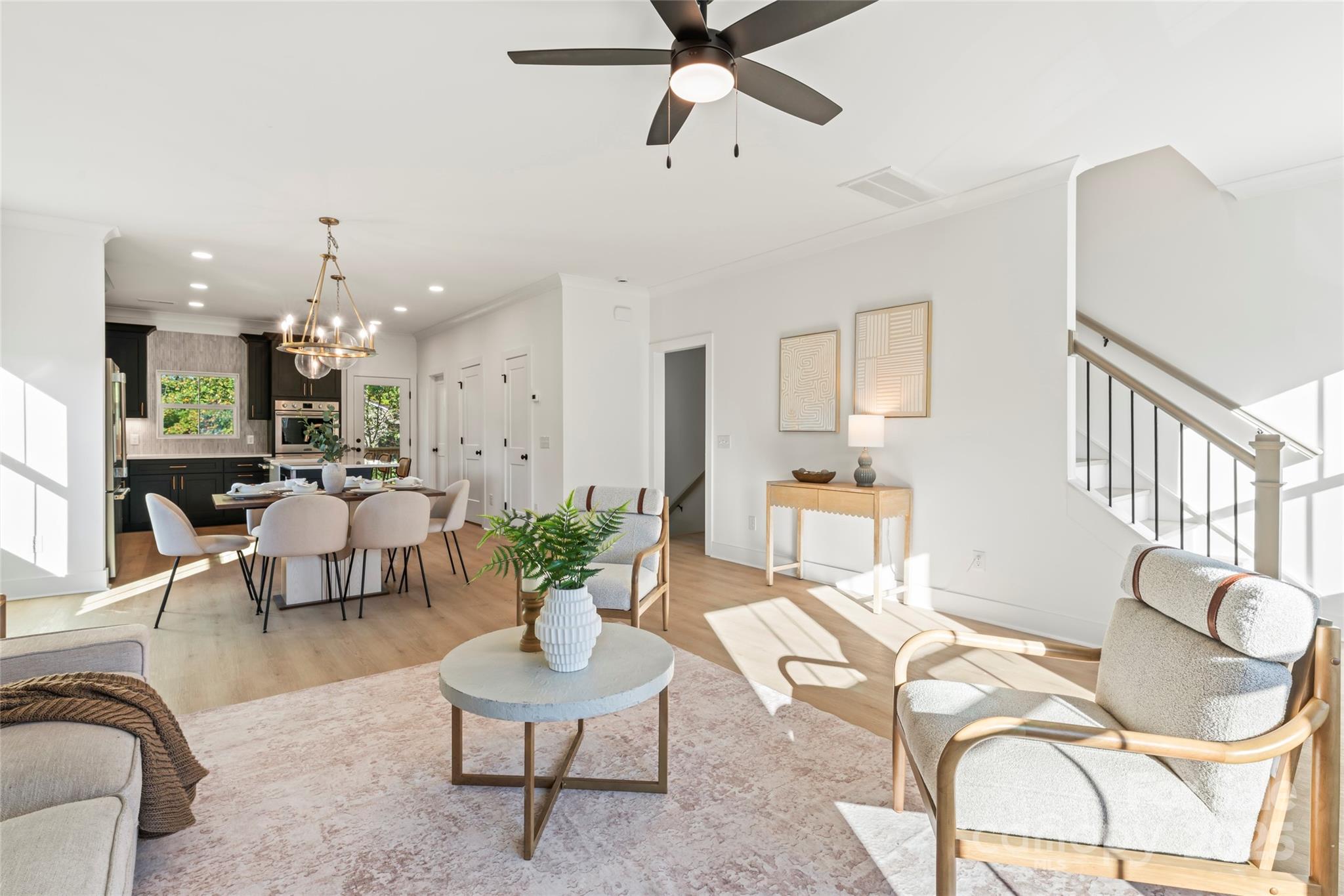 430 Bogue Drive, Unit 24 Fort Mill, SC 29708 - Photo 17 of 48 a living room with furniture and a chandelier