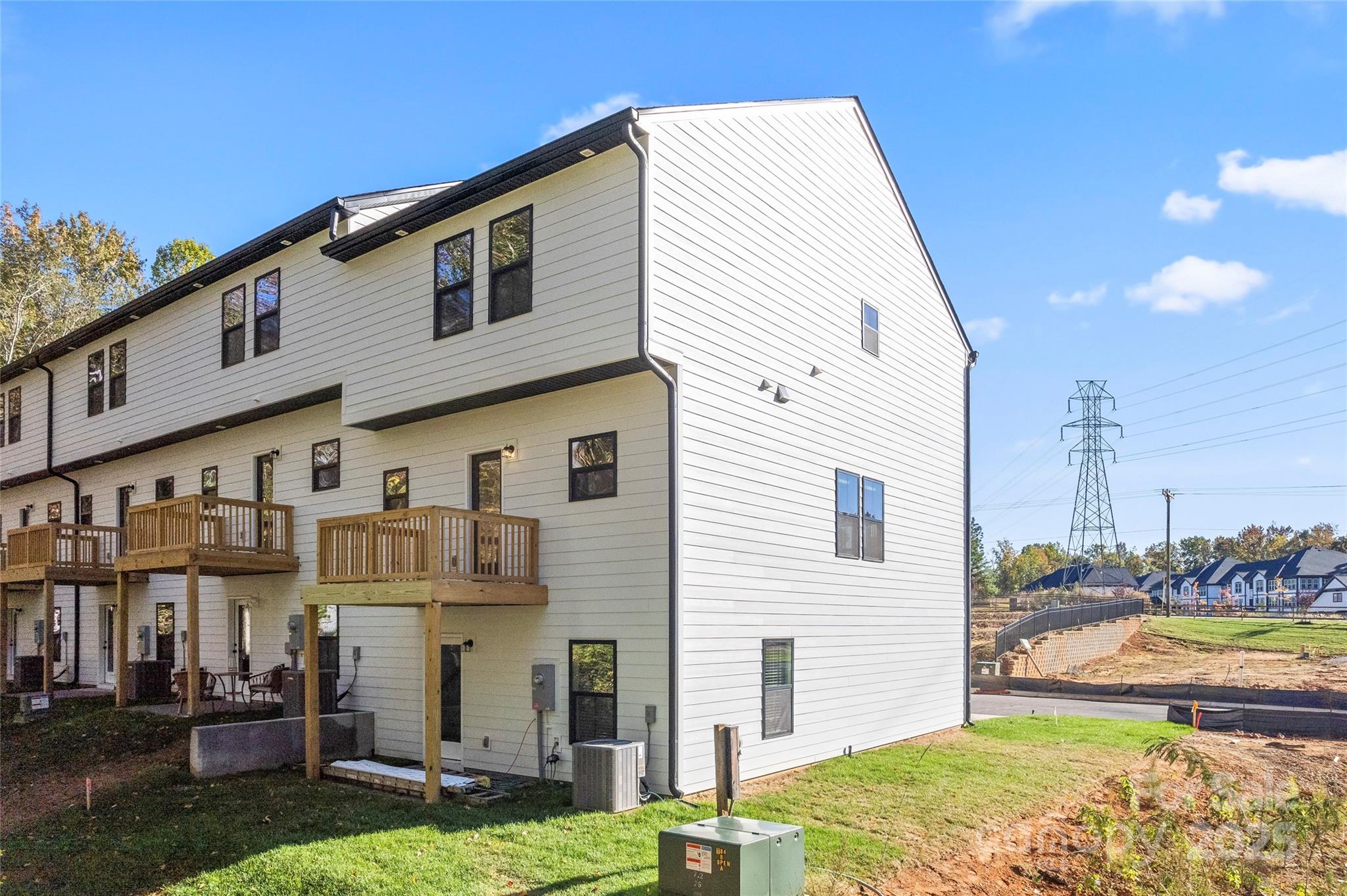 430 Bogue Drive, Unit 24 Fort Mill, SC 29708 - Photo 38 of 48 a view of a house with backyard and sitting area