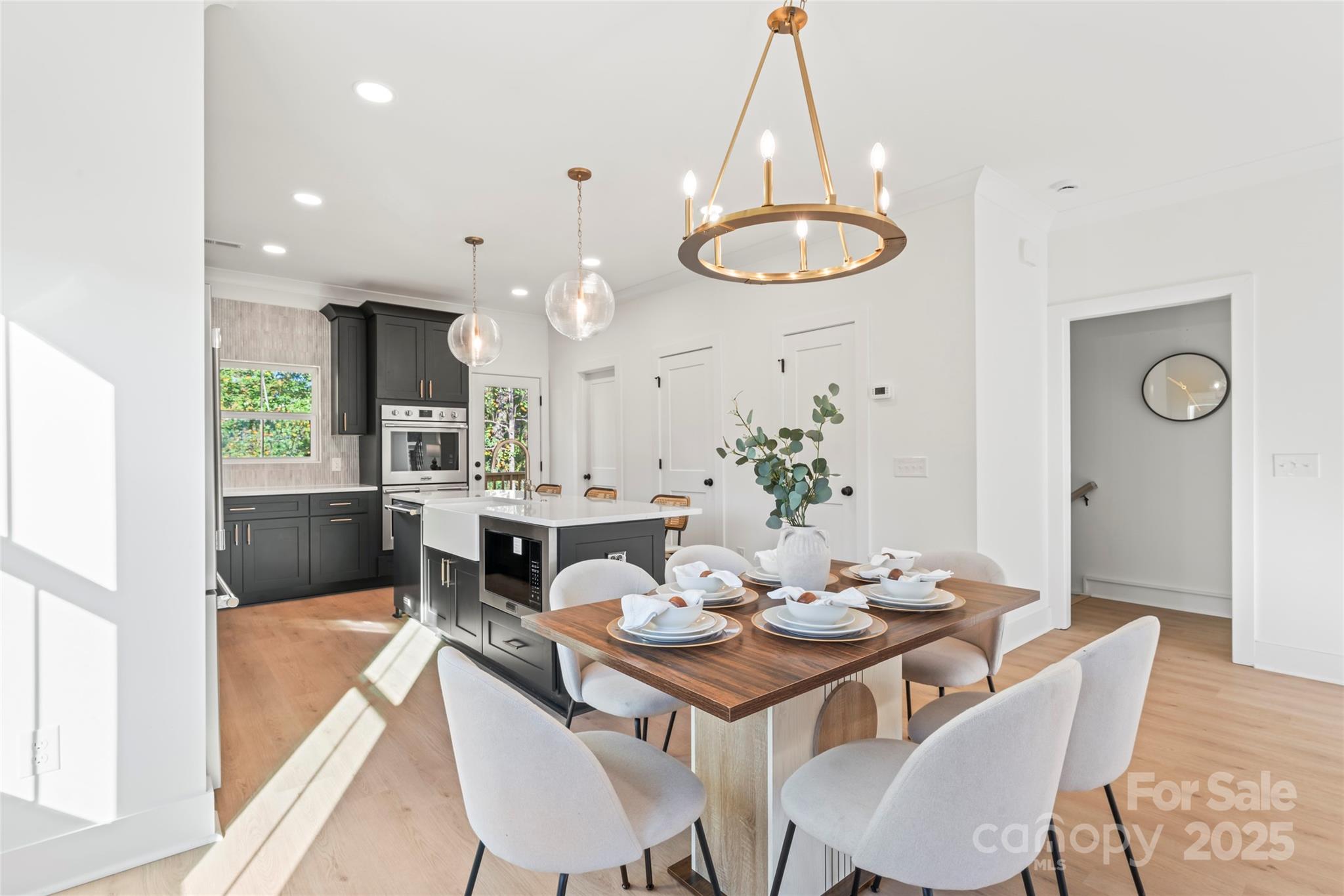 430 Bogue Drive, Unit 24 Fort Mill, SC 29708 - Photo 10 of 48 a dining room with granite countertop a table and chairs