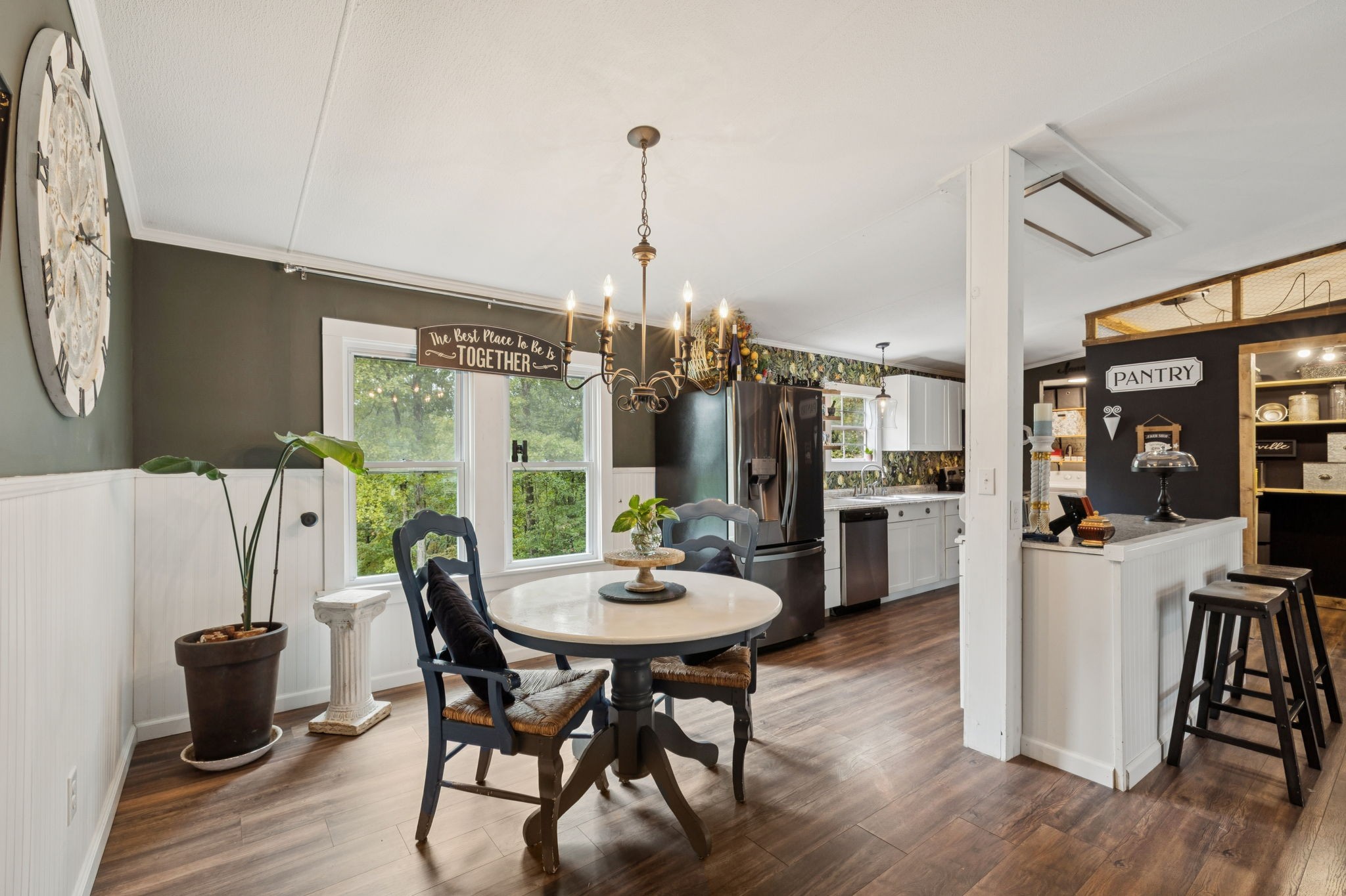 2108 Lance Court Centerville, TN 37033 - Photo 13 of 51 a dining room with furniture a chandelier and wooden floor