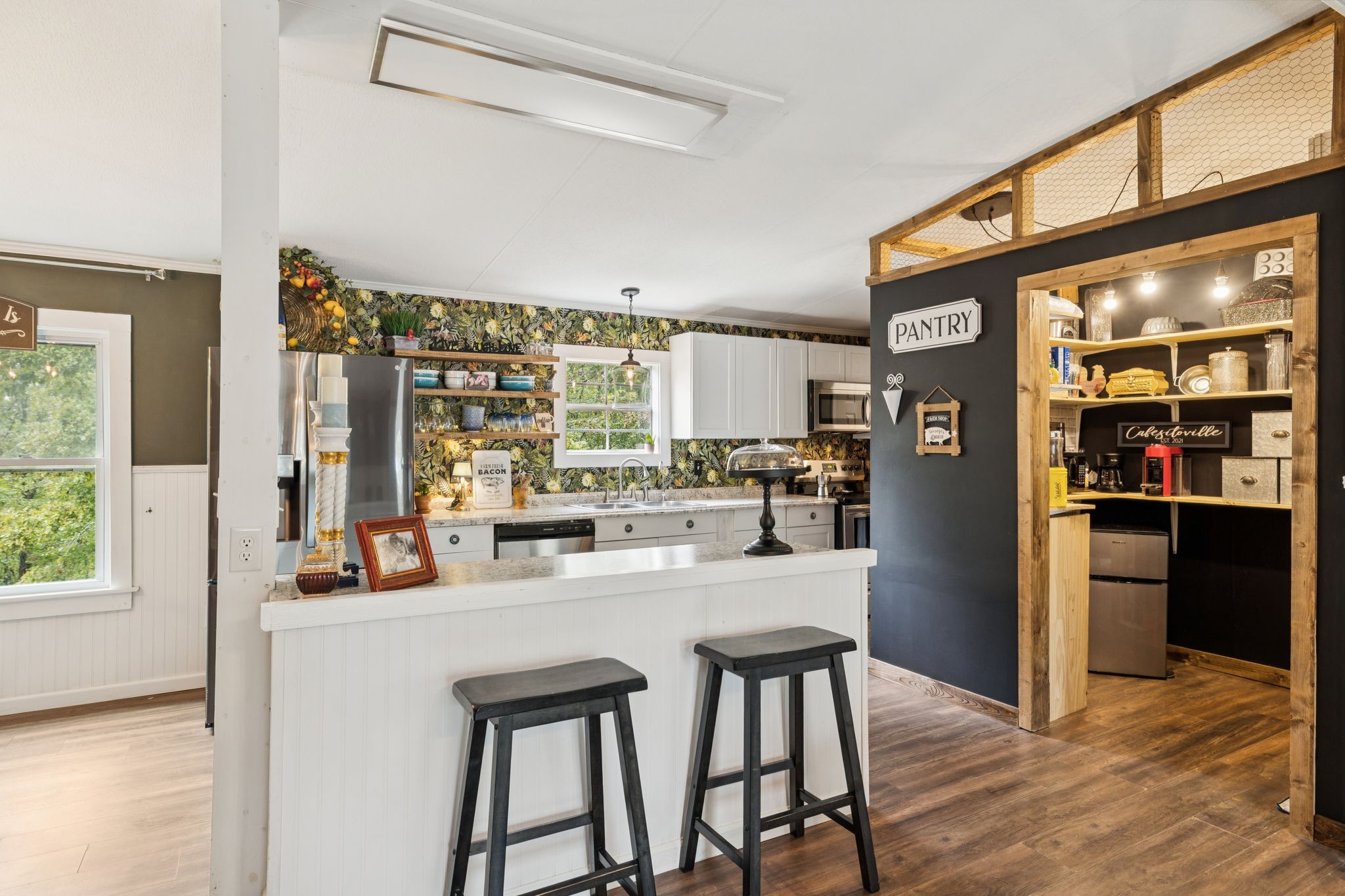 2108 Lance Court Centerville, TN 37033 - Photo 15 of 51 a kitchen with stainless steel appliances kitchen island granite countertop a refrigerator and a stove top oven