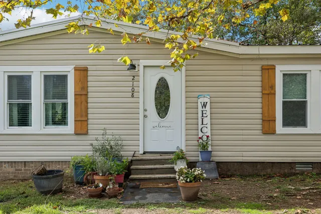 a view of a living room and dining room