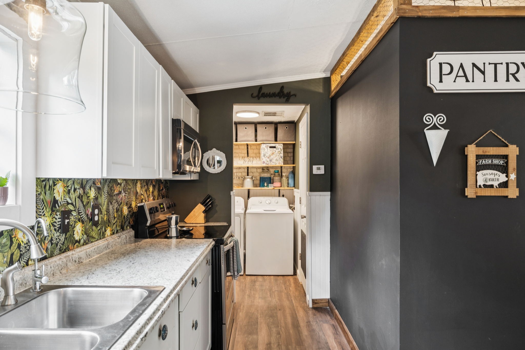 2108 Lance Court Centerville, TN 37033 - Photo 24 of 51 a kitchen with a sink and a refrigerator