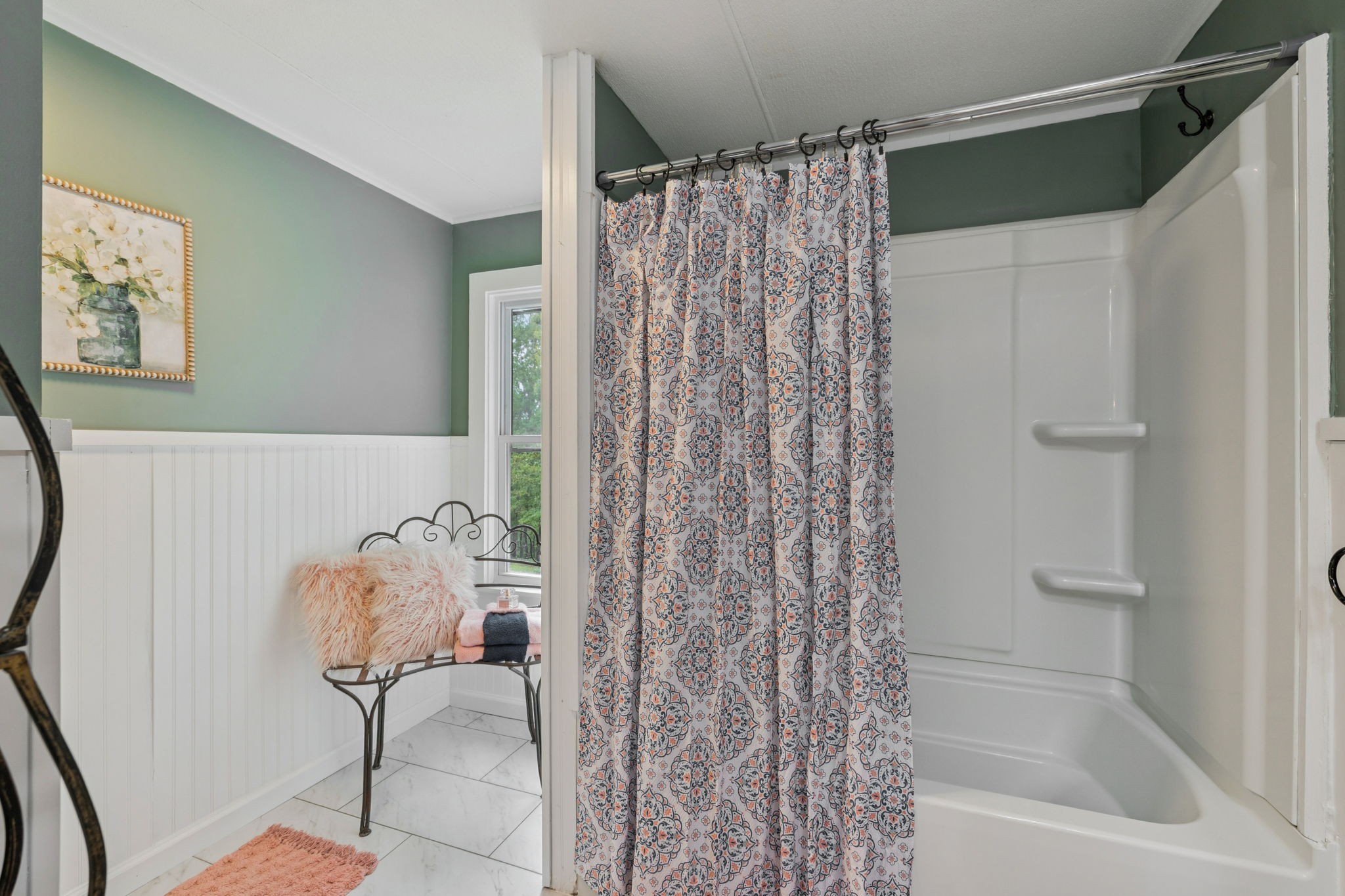 2108 Lance Court Centerville, TN 37033 - Photo 28 of 51 a bathroom with a shower curtain and a window