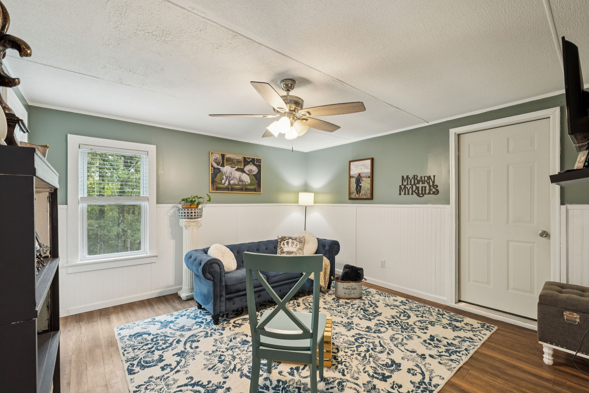2108 Lance Court Centerville, TN 37033 - Photo 29 of 51 a workspace with wooden floor and a ceiling fan