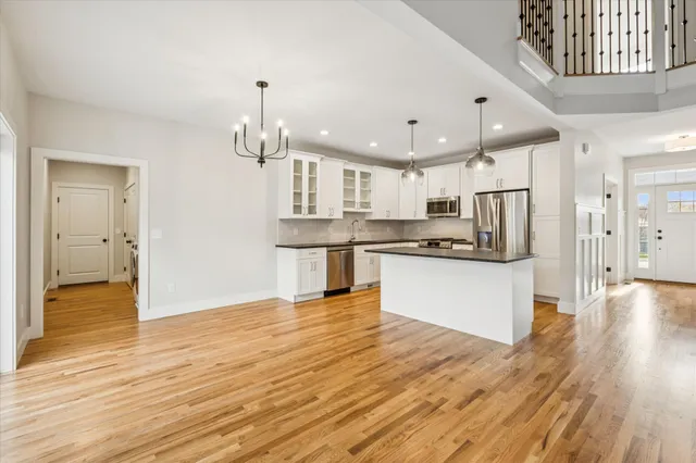 a view of kitchen with wooden floor